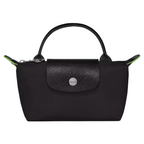 Longchamp Élan Mini Bag noszona przez kobietę jako torebka crossbody.