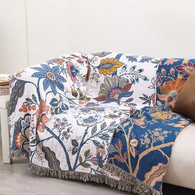 Artystyczny koc w stylu boho z motywem kwiatowym