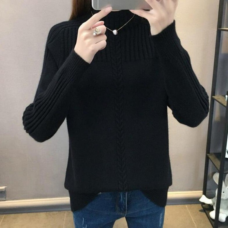 Damski sweter z golfem z ozdobnym splotem