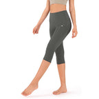 Damskie legginsy capri z kieszeniami