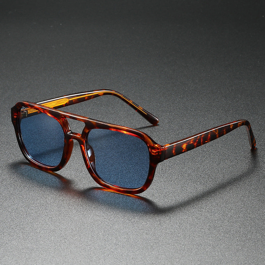 Damskie modne okulary przeciwsłoneczne w eleganckim, kanciastym designie
