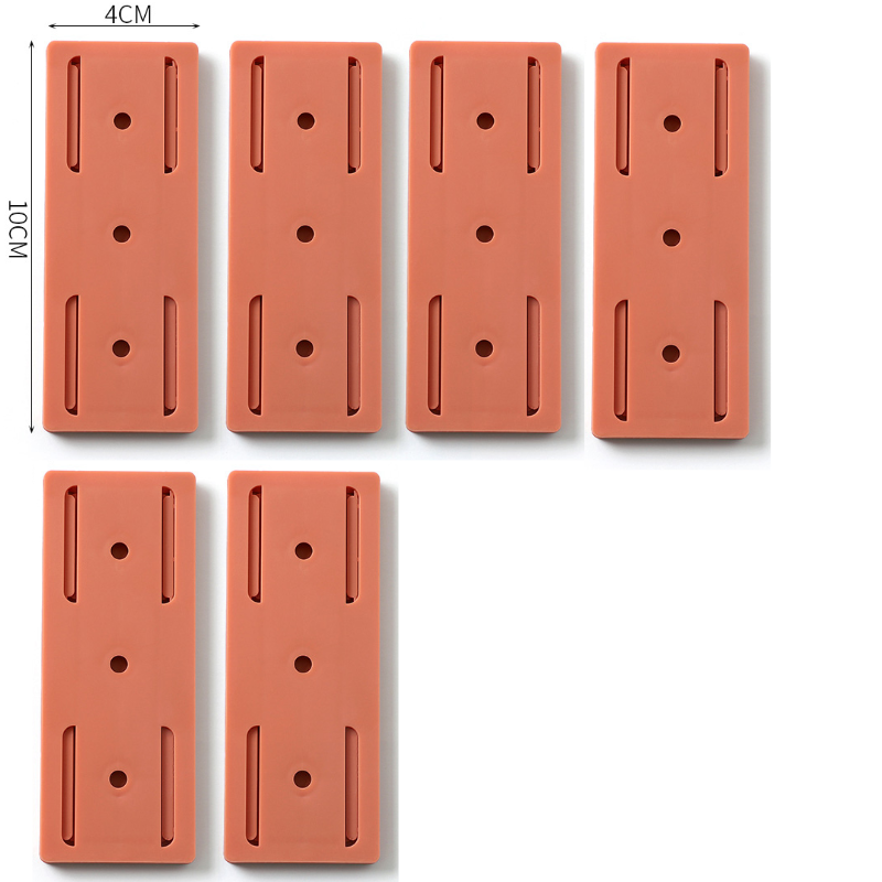 Elegancki samoprzylepny organizer gniazdek ściennych