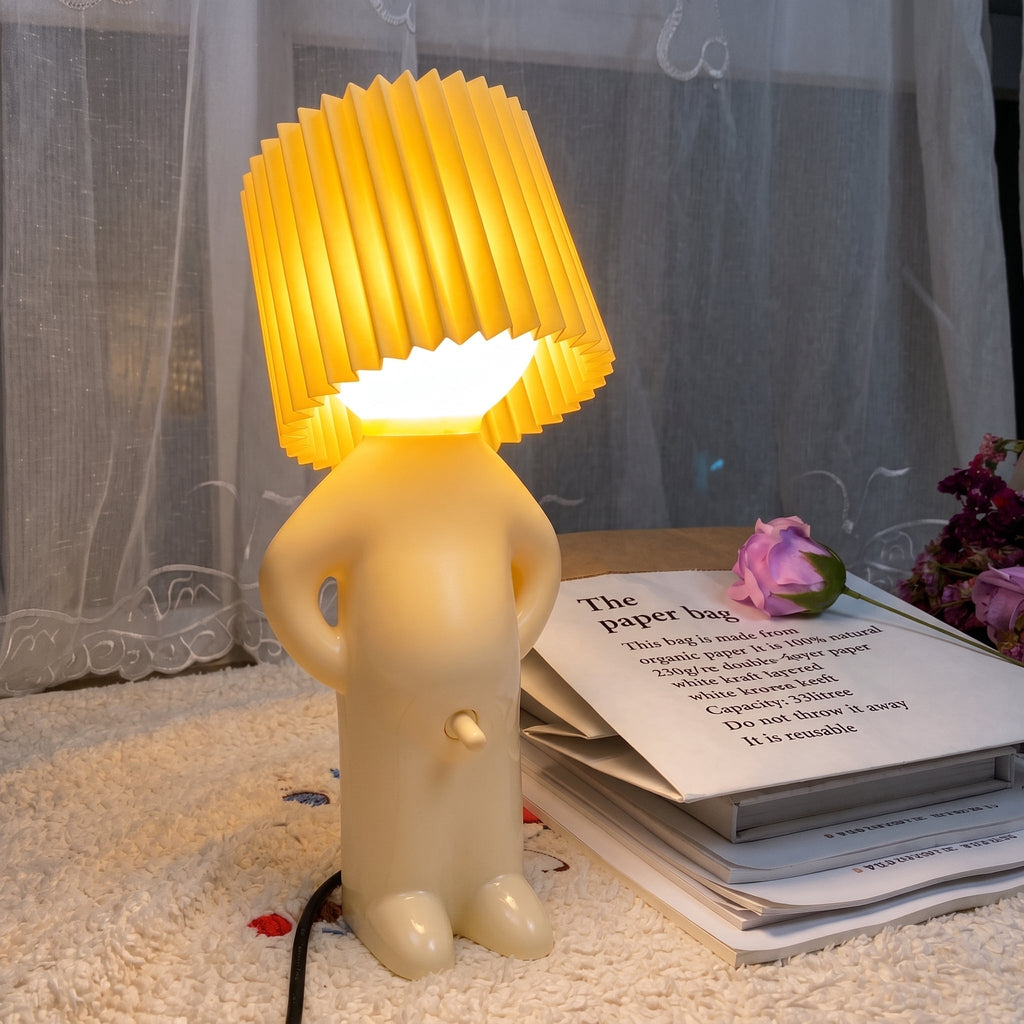 Lampa stołowa w kształcie figurki - plisowany klosz, kabel z tyłu