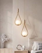 Nordycka lampa wisząca Drop w kształcie kropli ze szkła – minimalistyczne oświetlenie do jadalni i wyspy kuchennej