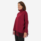 Sweter damski Mudflower z golfem i frędzlami o luźnym kroju poncho