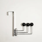 Wieszak ścienny obrotowy - ramiona zakończone kulkami