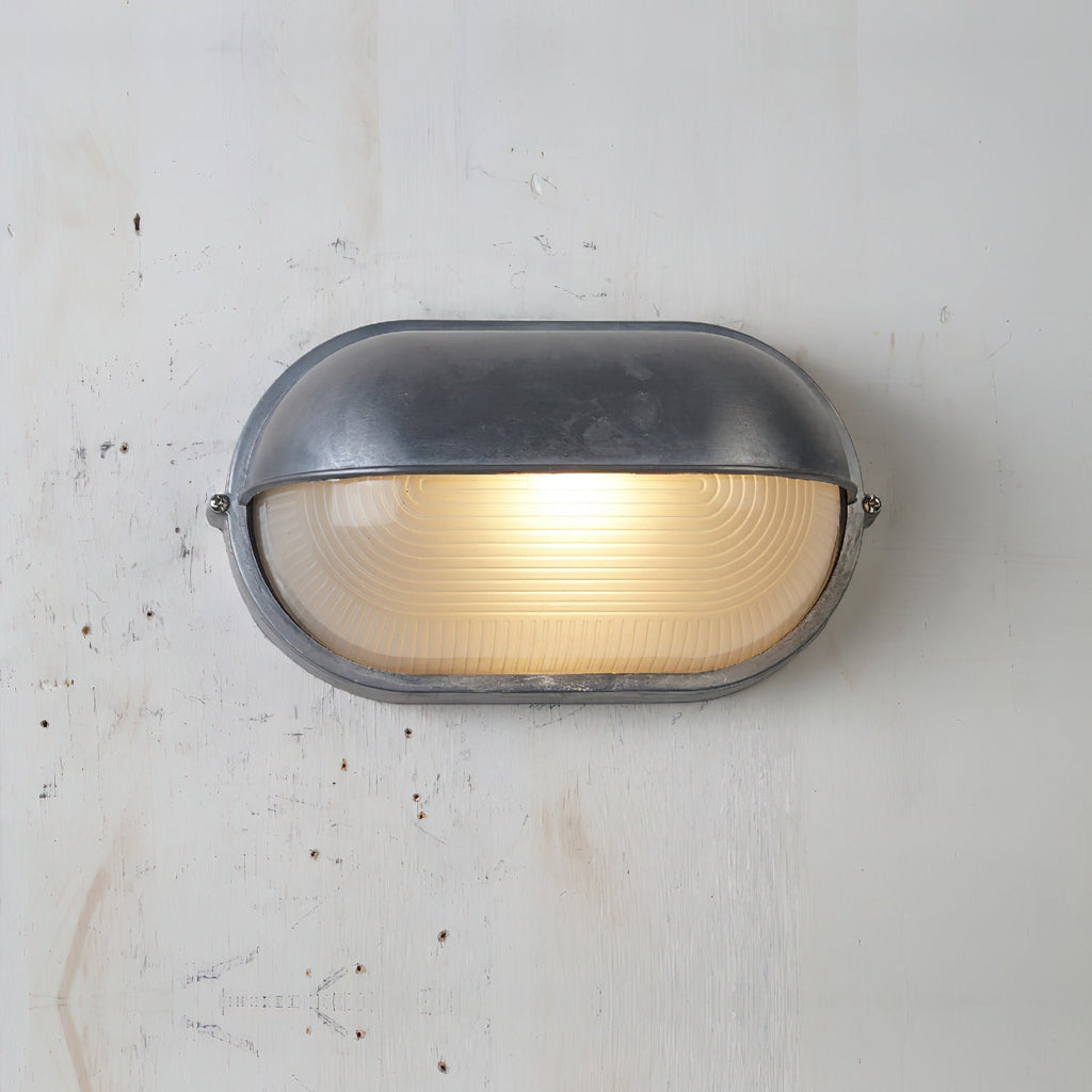 Zewnętrzna przemysłowa lampa ścienna typu bulkhead Owalny design odporny na warunki atmosferyczne